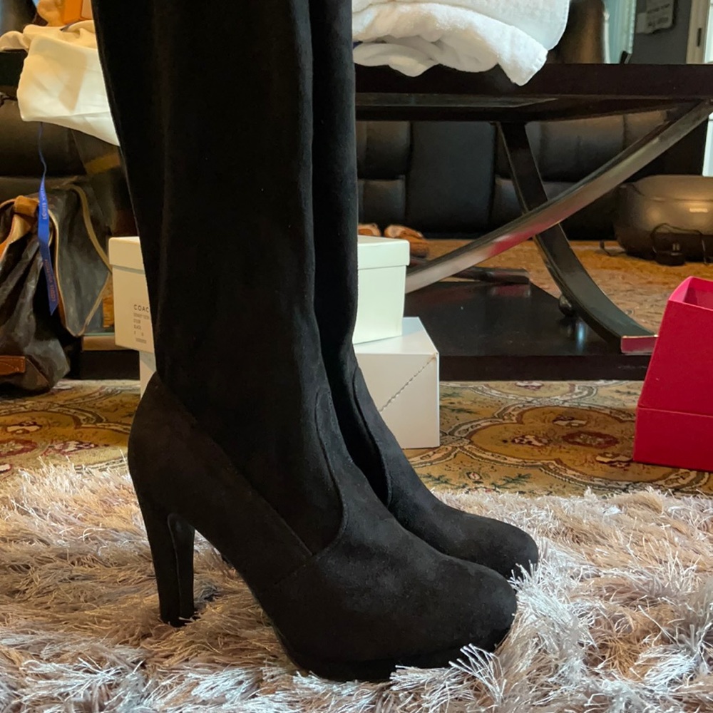 Knee high heel boots
